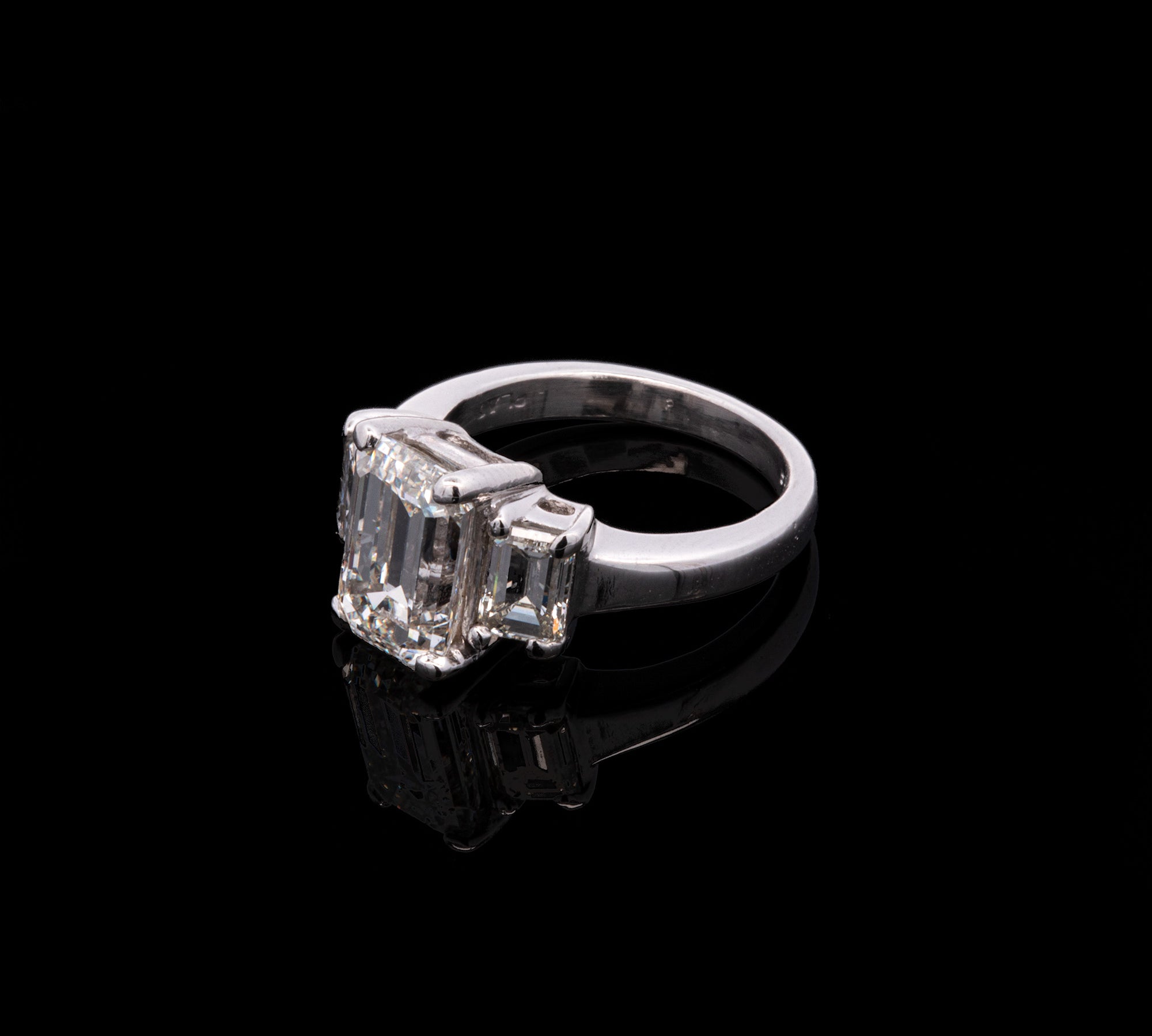 Platinum Three Stone Emerald Cut Diamond Ring