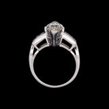 Platinum Marquise Diamond Ring With Channel Set French Cut Accent Diamonds, Circa 1950