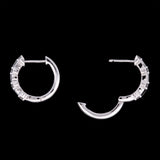 14K White Gold Baguette And Round Diamond Huggie Earrings