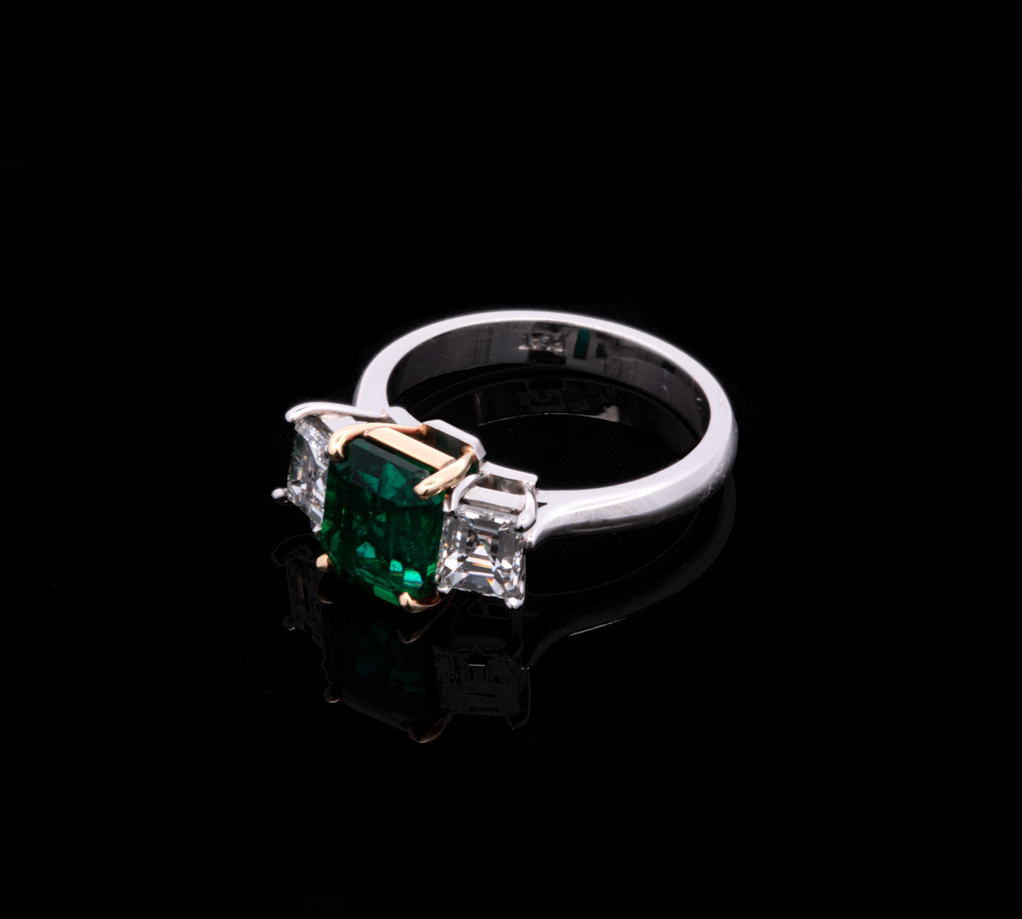 Platinum Emerald With 18K Yellow Gold Mounting And Rectangular Cut Diamond Ring