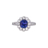 Platinum Tanzanite And Diamond Halo Ring