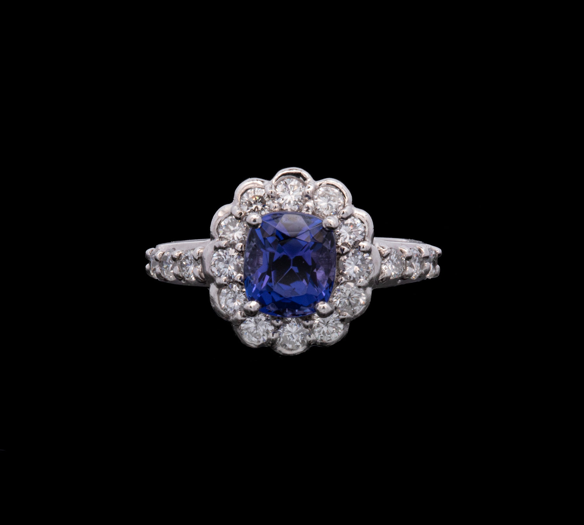 Platinum Tanzanite And Diamond Halo Ring