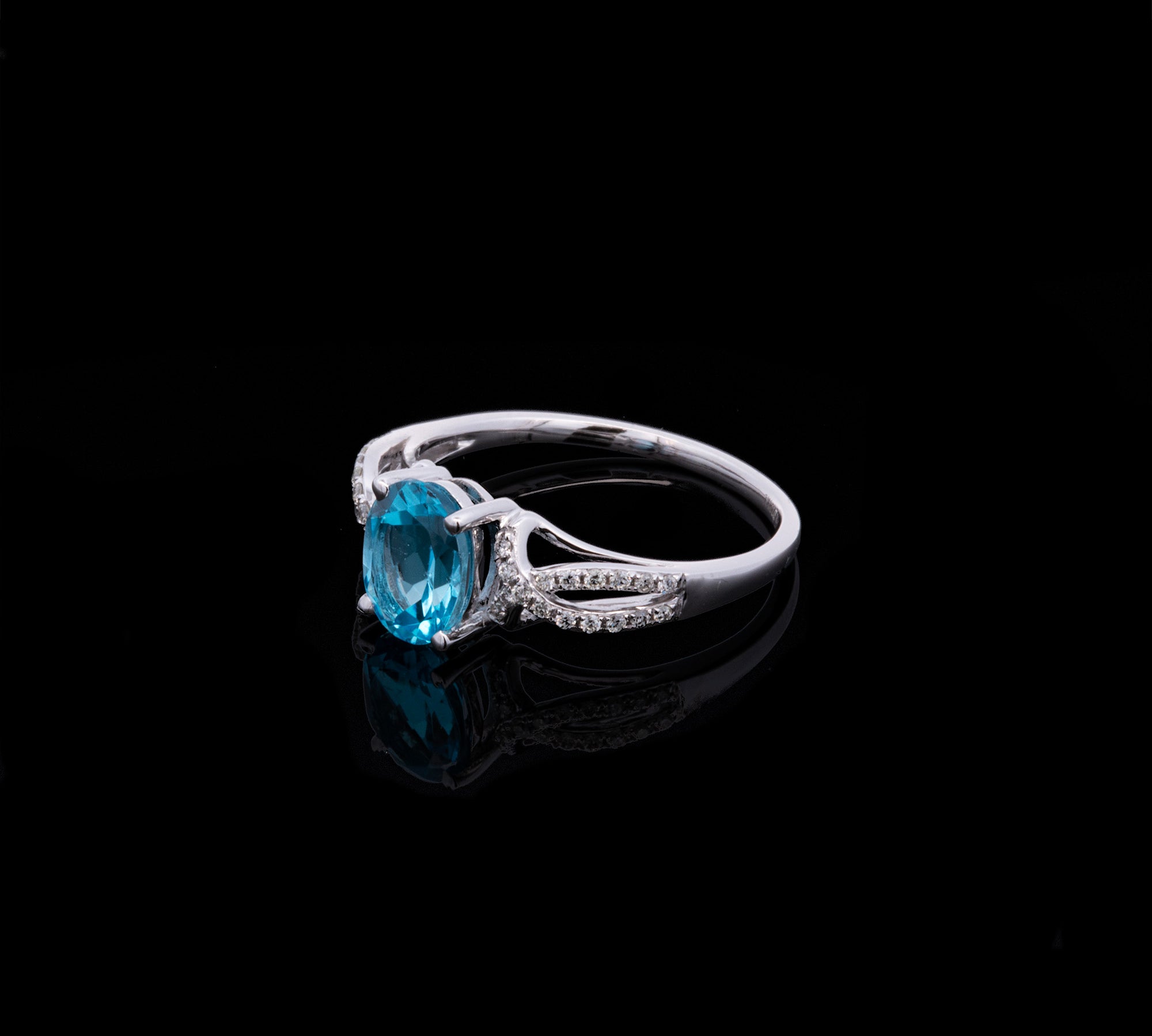 14K White Gold Oval Blue Topaz And Diamond Ring