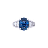 Platinum Oval Sapphire And Baguette Diamond Ring