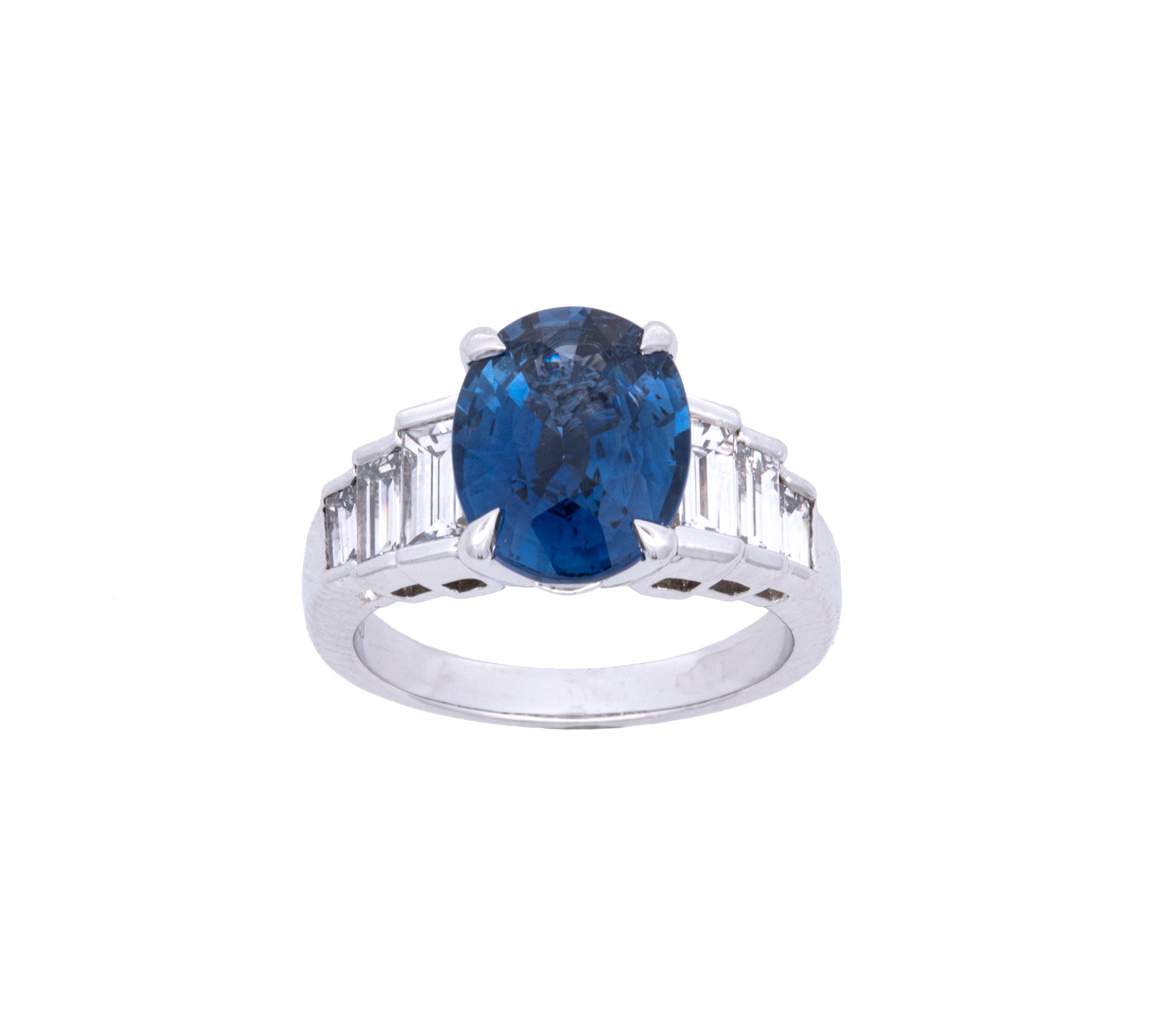 Platinum Oval Sapphire And Baguette Diamond Ring
