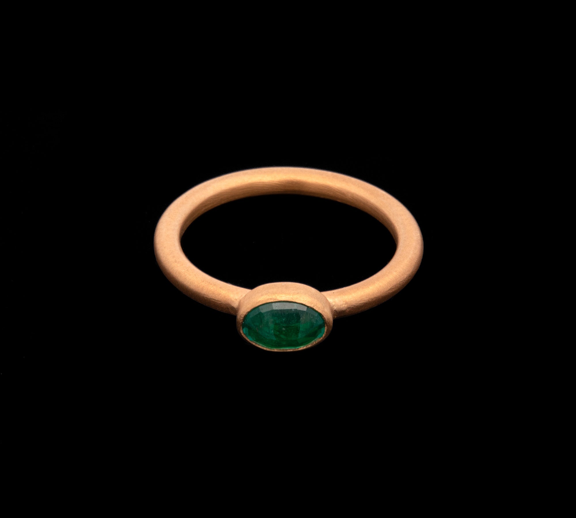 24K Yellow Gold Bezel Set Oval Emerald Ring