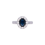18K White Gold Oval Sapphire And Diamond Halo Ring