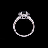 18K White Gold Oval Sapphire And Diamond Halo Ring