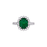 18K White Gold Emerald And Diamond Halo Ring