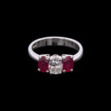 Platinum Three Stone Oval Diamond And Ruby Ring