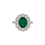 18K White Gold Oval Emerald And Diamond Halo Ring
