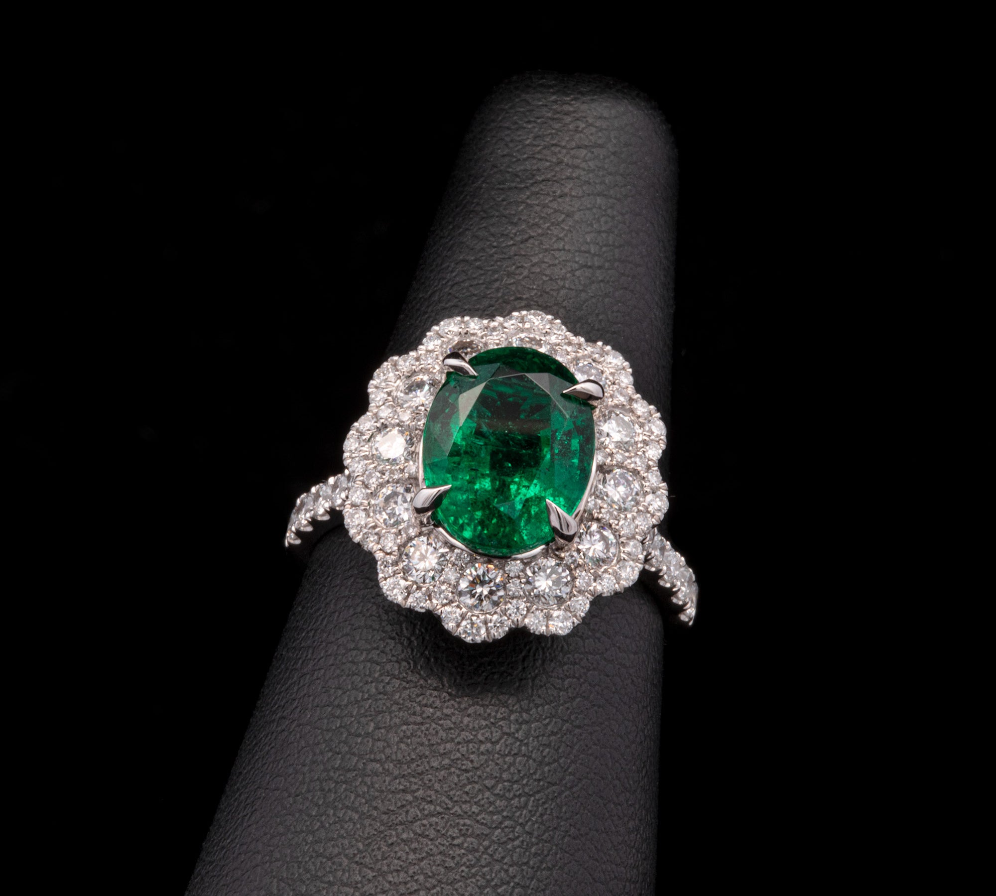 18K White Gold Oval Emerald And Diamond Halo Ring