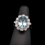 18K White Gold Oval Aquamarine And Diamond Halo Ring