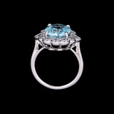18K White Gold Oval Aquamarine And Diamond Halo Ring