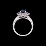 18K White Gold Sapphire And Double Diamond Halo Ring