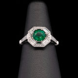 Platinum Round Emerald And Diamond Ring