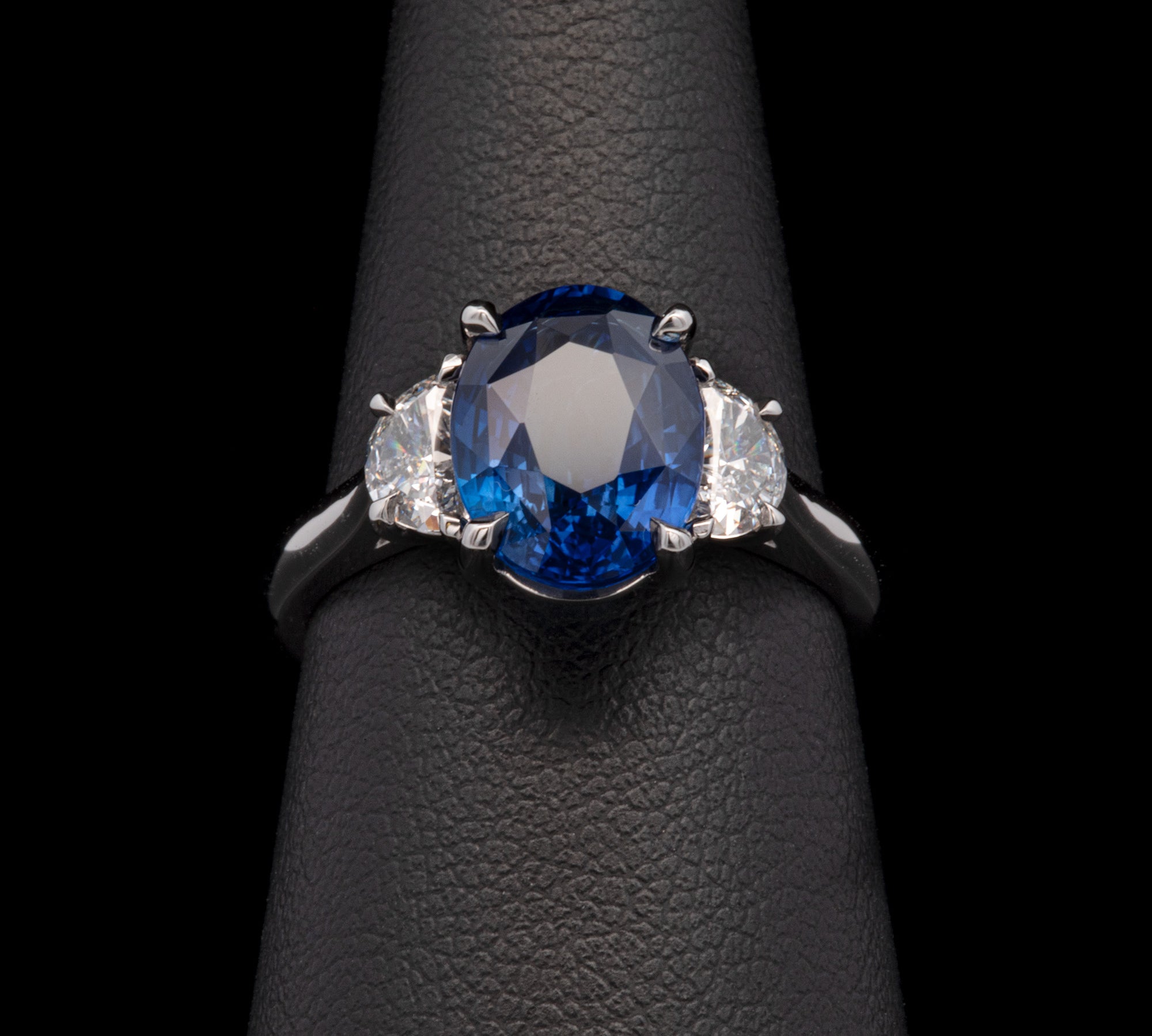 Platinum Oval Sapphire And Half Moon Diamond Ring