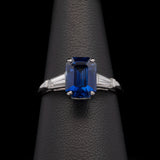 Platinum Emerald Cut Sapphire And Tapered Baguette Diamond Ring