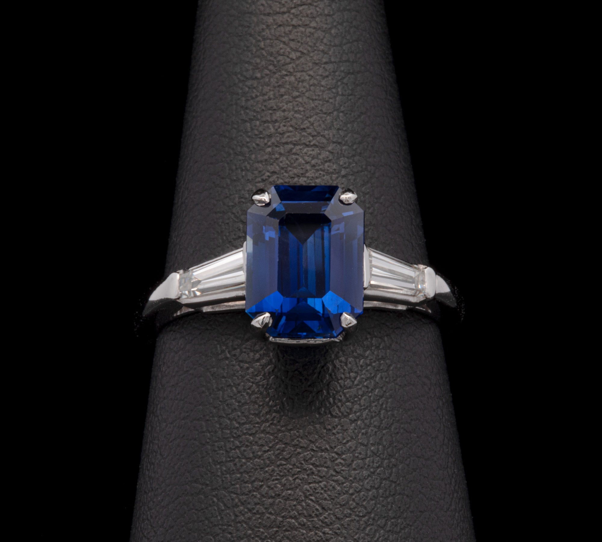 Platinum Emerald Cut Sapphire And Tapered Baguette Diamond Ring