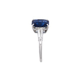 Platinum Emerald Cut Sapphire And Tapered Baguette Diamond Ring