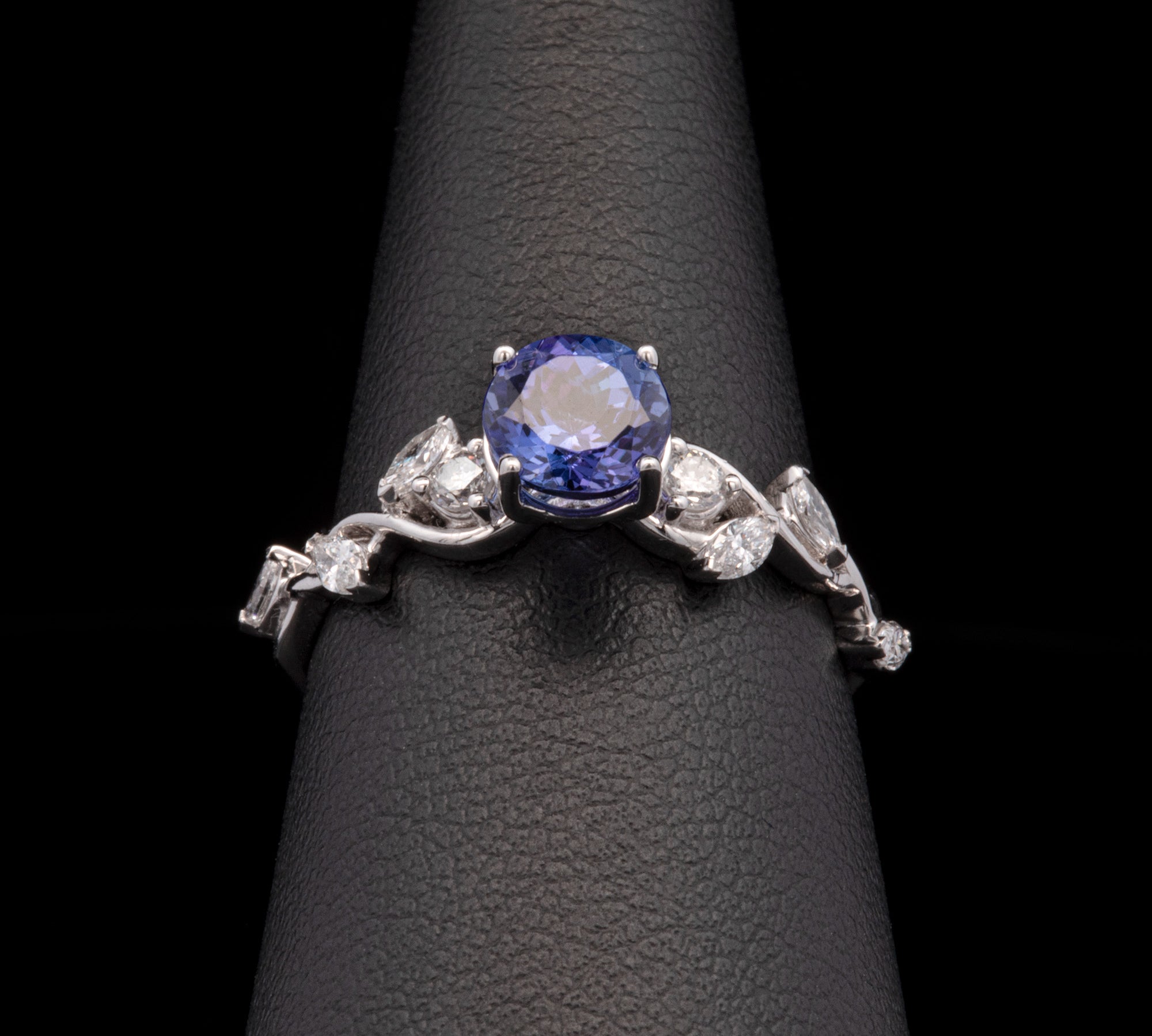 14K White Gold Tanzanite And Offset Marquise Cut Diamond Ring
