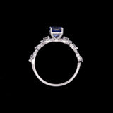 14K White Gold Tanzanite And Offset Marquise Cut Diamond Ring