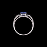 14K White Gold Tanzanite And Twisted Diamond Shank Ring