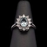 14K White Gold Oval Aquamarine And Diamond Halo Ring