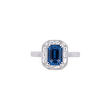 18K White Gold Emerald Cut Sapphire And Baguette Diamond Halo Ring