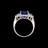 14K White Gold Oval Tanzanite And Diamond Ring