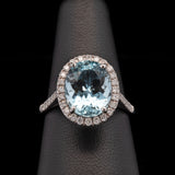 14K White Gold Oval Aquamarine And Diamond Halo Ring