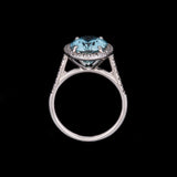 14K White Gold Oval Aquamarine And Diamond Halo Ring