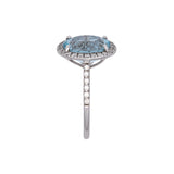 14K White Gold Oval Aquamarine And Diamond Halo Ring