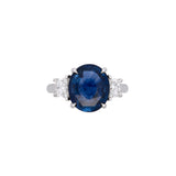 Platinum Oval Sapphire And Trapezoid Diamond Ring