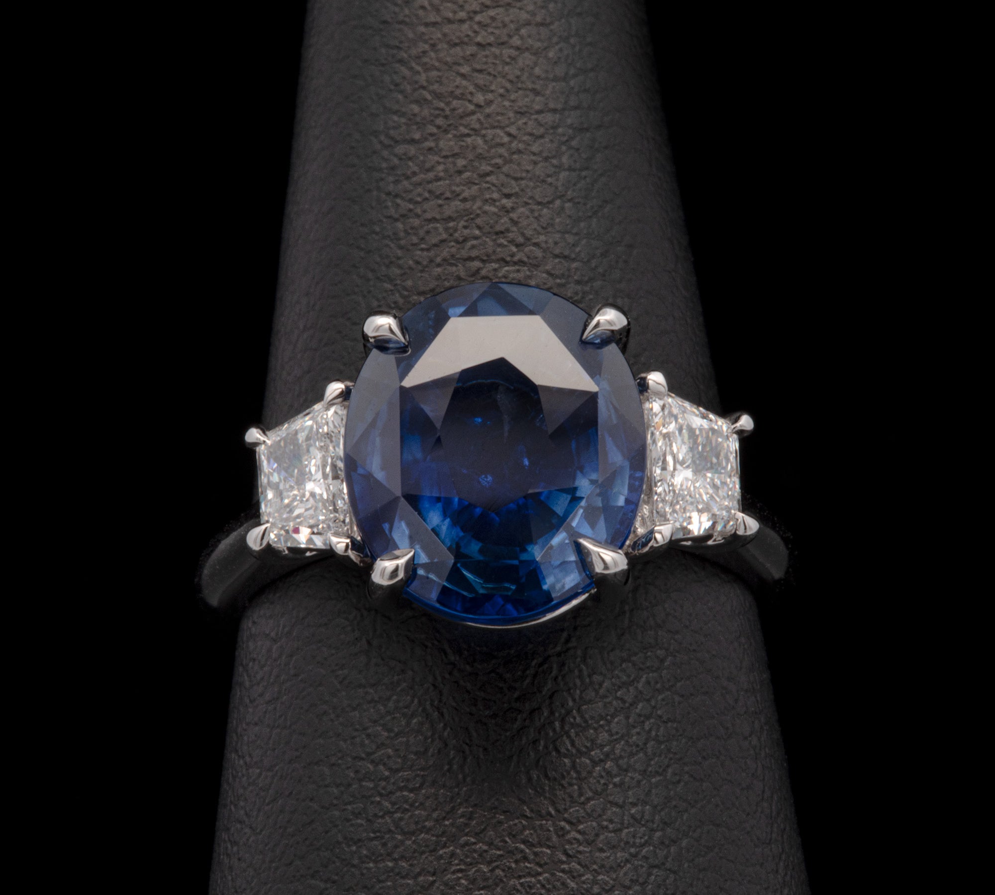 Platinum Oval Sapphire And Trapezoid Diamond Ring