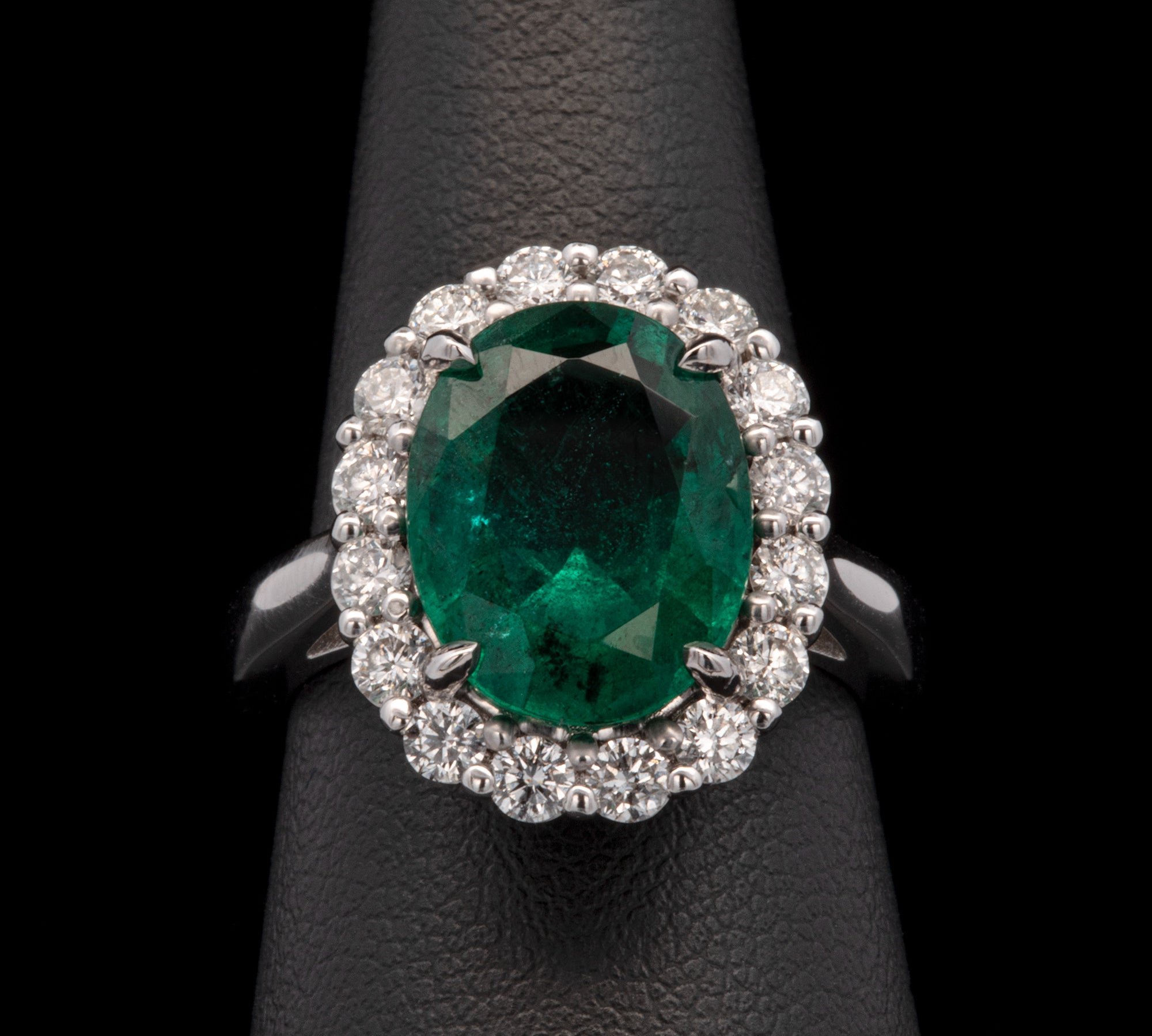 18K White Gold Oval Emerald And Diamond Halo Ring