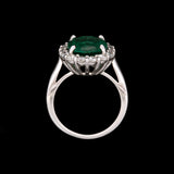 18K White Gold Oval Emerald And Diamond Halo Ring