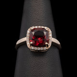 14K Yellow Gold Garnet And Diamond Halo Ring