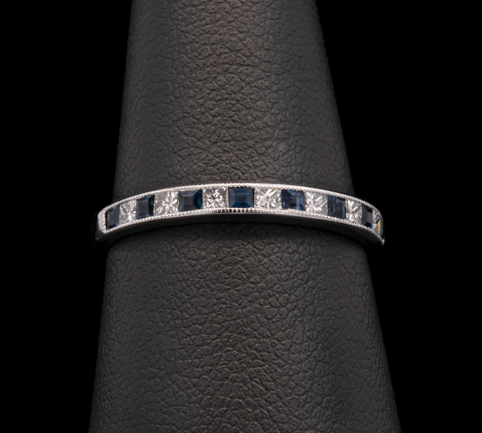 18K White Gold Sapphire And Diamond Channel Set Half Eternity Band With Milgrain Edge
