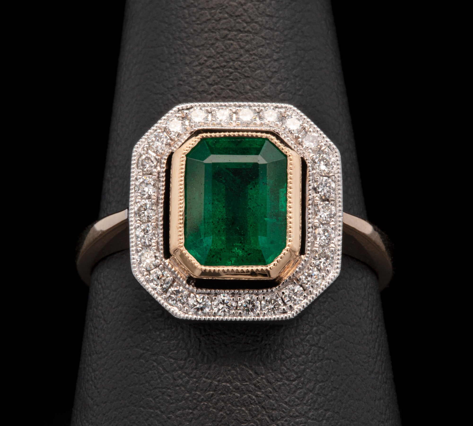 18K Yellow And White Gold Bezel Set Emerald Ring With Diamond Halo