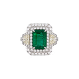 18K White Gold Emerald And Diamond Double Halo Ring With Light Fancy Yellow Trapezoid Cut Diamonds