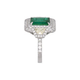 18K White Gold Emerald And Diamond Double Halo Ring With Light Fancy Yellow Trapezoid Cut Diamonds