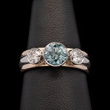 Platinum And 18K Yellow Gold Bezel Set Blue And White Diamond Ring
