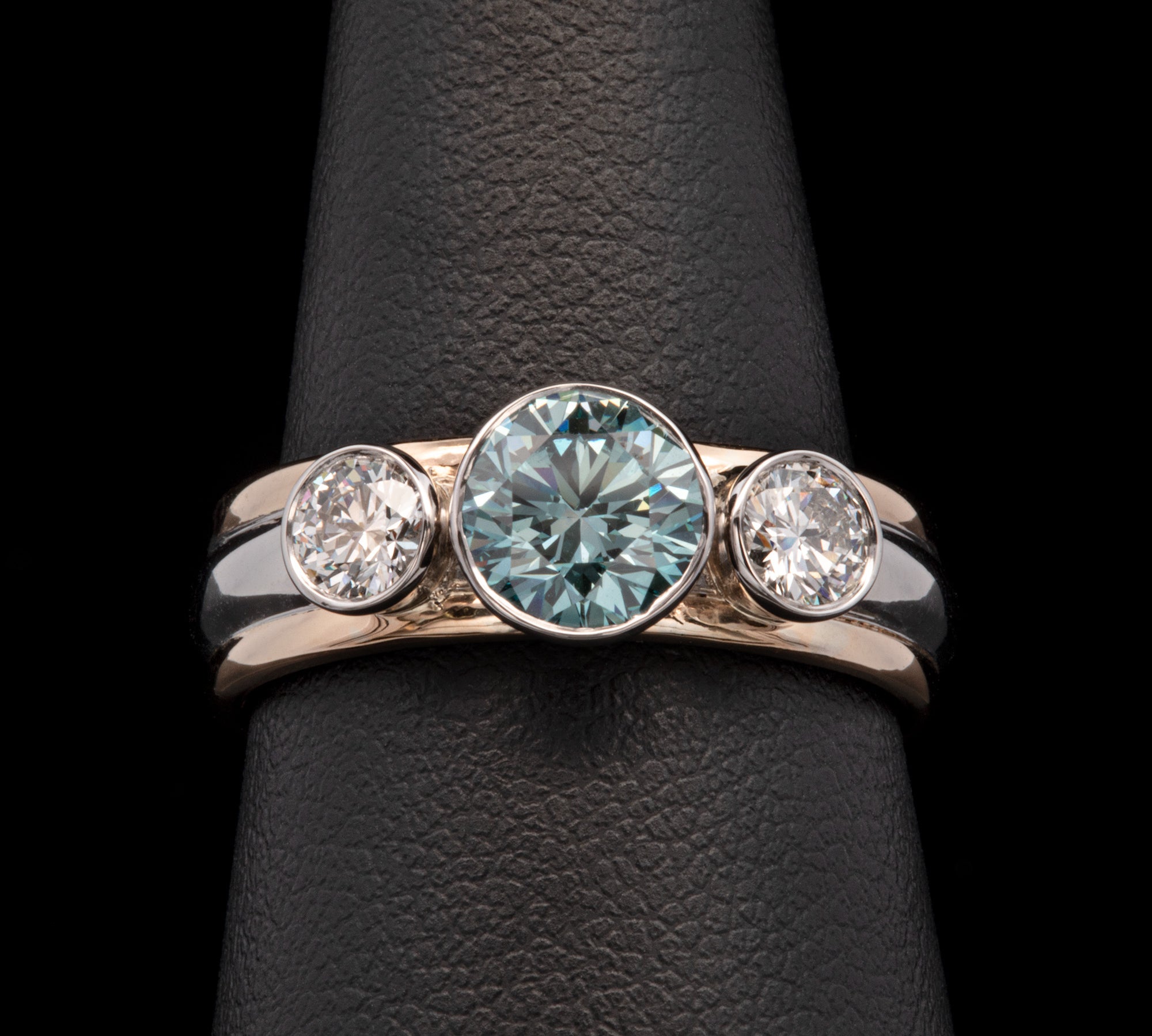 Platinum And 18K Yellow Gold Bezel Set Blue And White Diamond Ring