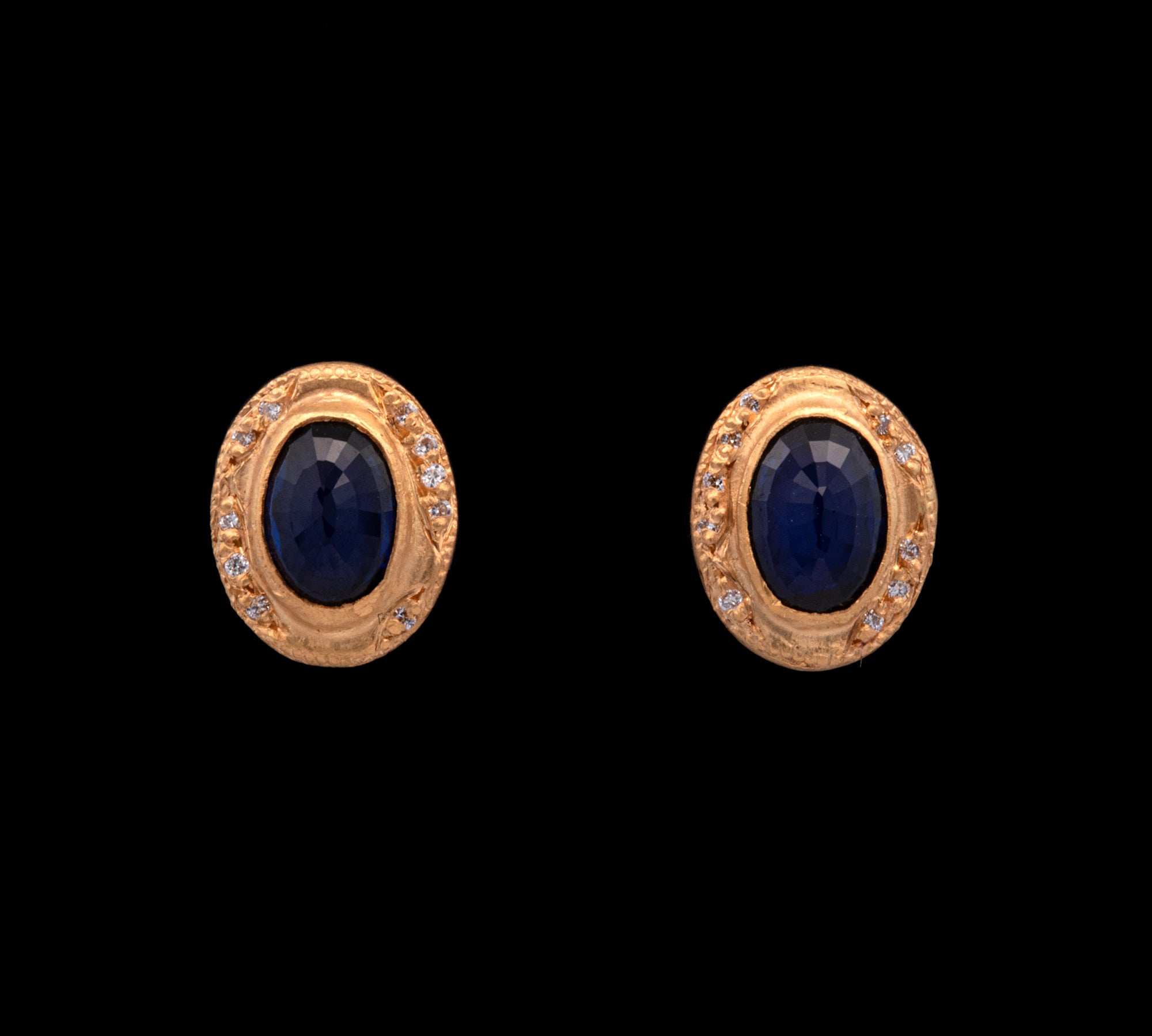 24K And 18K Yellow Gold Bezel Set Oval Sapphire Stud Earrings With Diamond Accents