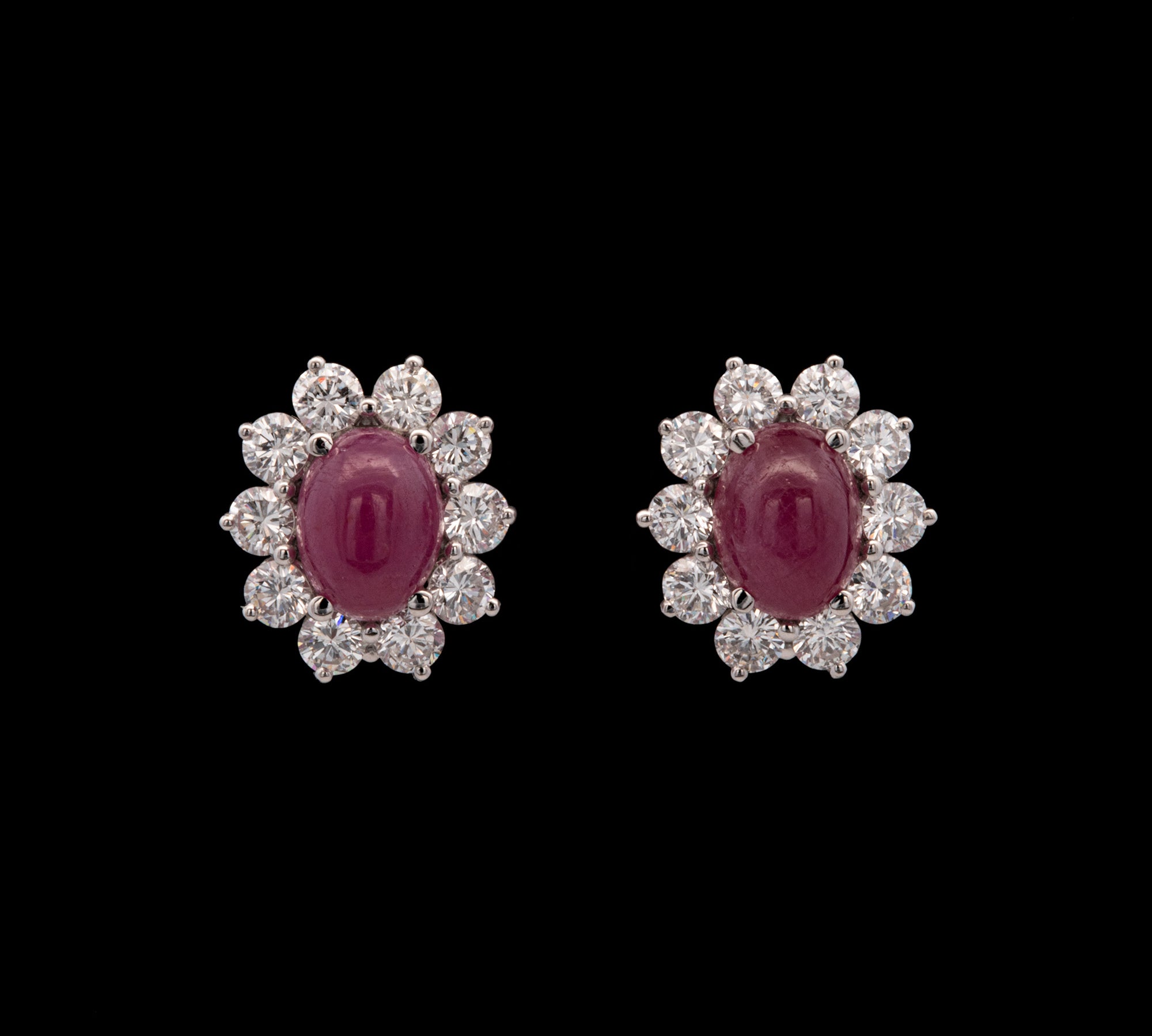 Platinum Cabochon Ruby And Diamond Halo Stud Earrings