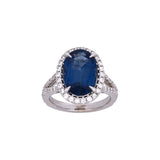 18K White Gold Oval Sapphire And Diamond Halo Ring