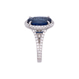 18K White Gold Oval Sapphire And Diamond Halo Ring