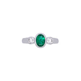 18K White Gold Bezel Set Oval Emerald And Round Diamond Ring