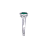 18K White Gold Bezel Set Oval Emerald And Round Diamond Ring